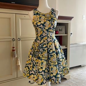 H & M fully lined dress with open back cut out. Fabulous fit.